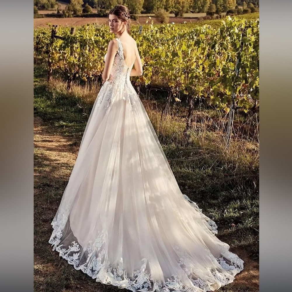 White wedding gown size 12 - Picture 2 of 4